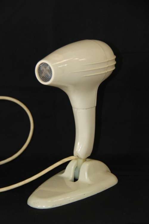 An exquisite vintage (1955) General Electric hair dryer w/ box & stand in perfect working condition