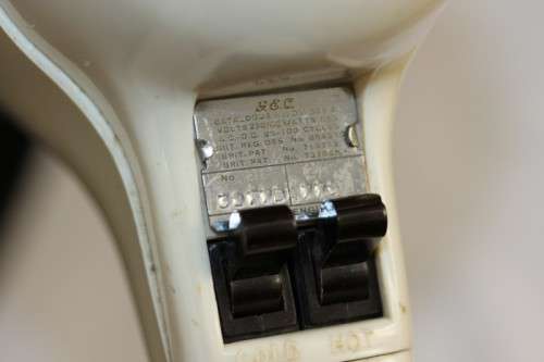 An exquisite vintage (1955) General Electric hair dryer w/ box & stand in perfect working condition