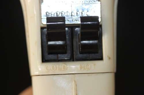 An exquisite vintage (1955) General Electric hair dryer w/ box & stand in perfect working condition