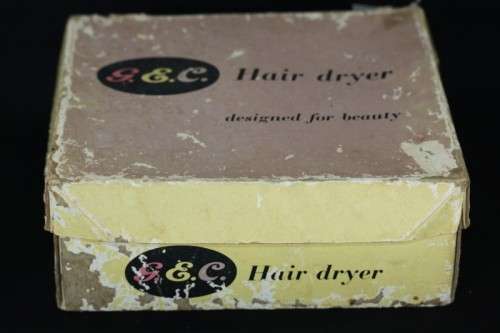 An exquisite vintage (1955) General Electric hair dryer w/ box & stand in perfect working condition