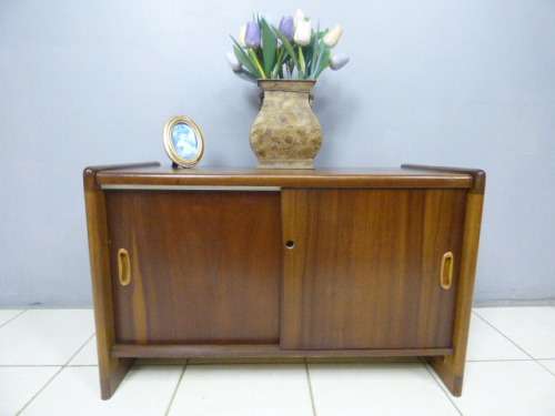 A stunning Teak cabinet with sliding doors and loads of space!! Lovely in a home or office!!!