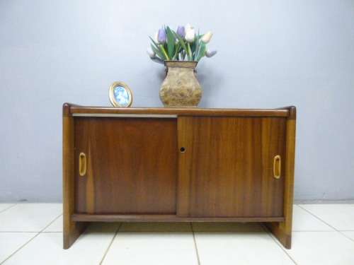 A stunning Teak cabinet with sliding doors and loads of space!! Lovely in a home or office!!!
