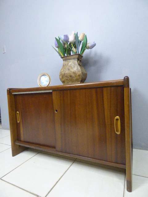 A stunning Teak cabinet with sliding doors and loads of space!! Lovely in a home or office!!!