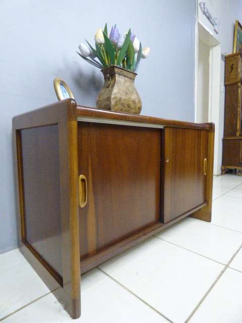 A stunning Teak cabinet with sliding doors and loads of space!! Lovely in a home or office!!!