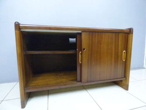 A stunning Teak cabinet with sliding doors and loads of space!! Lovely in a home or office!!!