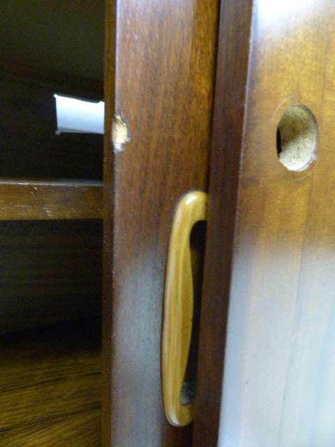 A stunning Teak cabinet with sliding doors and loads of space!! Lovely in a home or office!!!