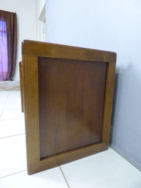 A stunning Teak cabinet with sliding doors and loads of space!! Lovely in a home or office!!!