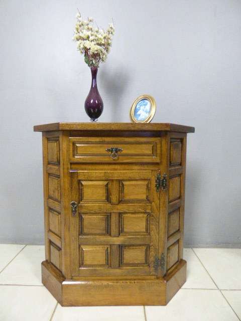 An exquisite vintage solid oak corner display cabinet with a large cupboard. Stunning in any home!!