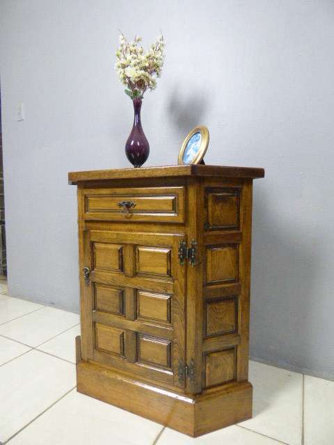 An exquisite vintage solid oak corner display cabinet with a large cupboard. Stunning in any home!!
