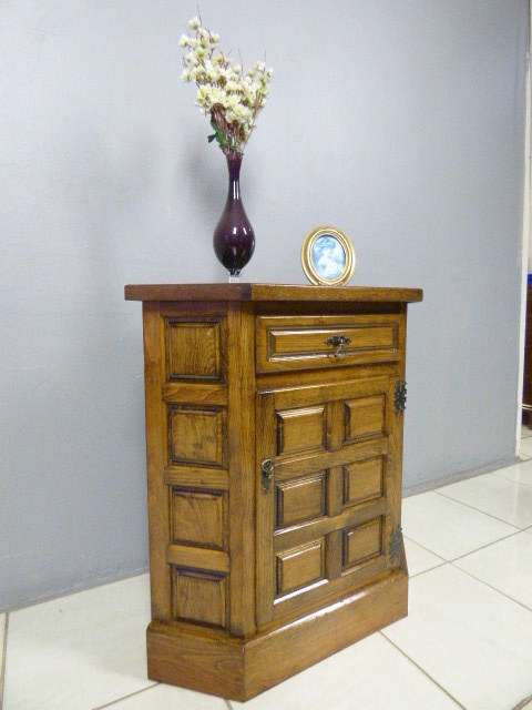 An exquisite vintage solid oak corner display cabinet with a large cupboard. Stunning in any home!!