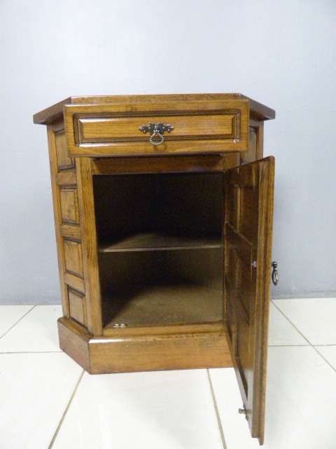 An exquisite vintage solid oak corner display cabinet with a large cupboard. Stunning in any home!!