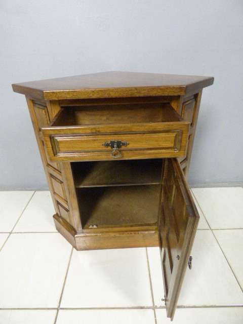 An exquisite vintage solid oak corner display cabinet with a large cupboard. Stunning in any home!!