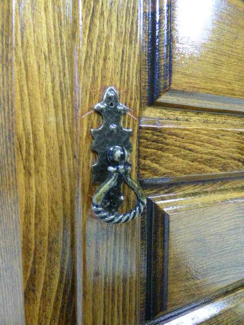 An exquisite vintage solid oak corner display cabinet with a large cupboard. Stunning in any home!!