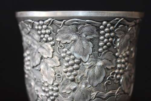 A stunning pair of silver plated (on copper) wine goblets w/ stunning detailing on them