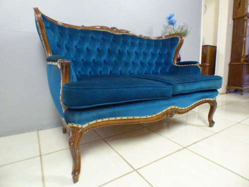 magnificent hand carved Victorian sofa's with deep button detailing and padded armrest.