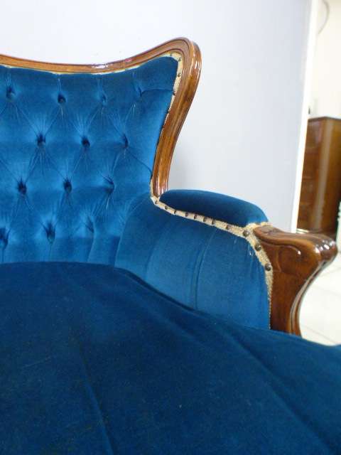 magnificent hand carved Victorian sofa's with deep button detailing and padded armrest.