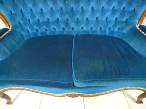 magnificent hand carved Victorian sofa's with deep button detailing and padded armrest.