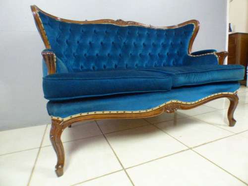 magnificent hand carved Victorian sofa's with deep button detailing and padded armrest.