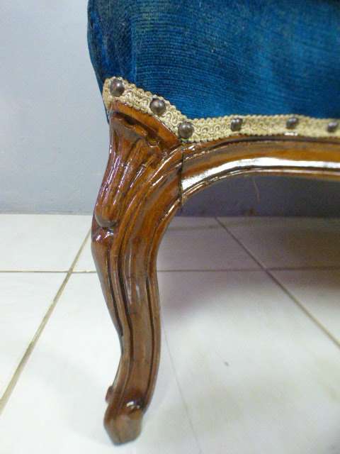 magnificent hand carved Victorian sofa's with deep button detailing and padded armrest.