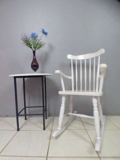 An exquisite white painted rocking chair - gorgeous in a baby room or on a patio!!!
