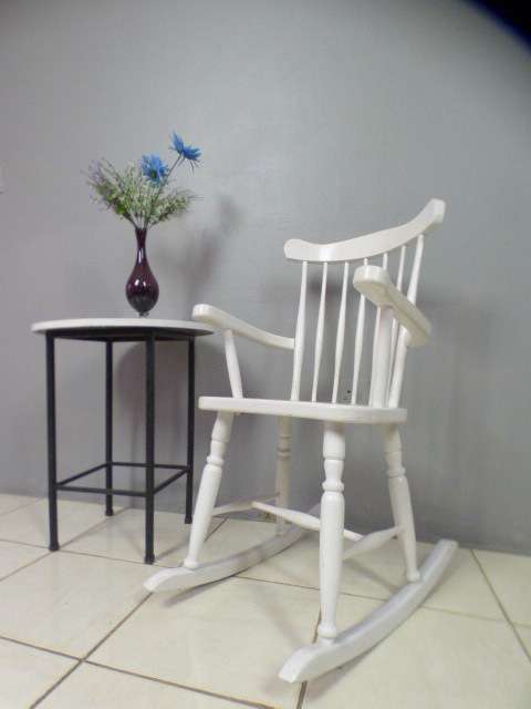 An exquisite white painted rocking chair - gorgeous in a baby room or on a patio!!!