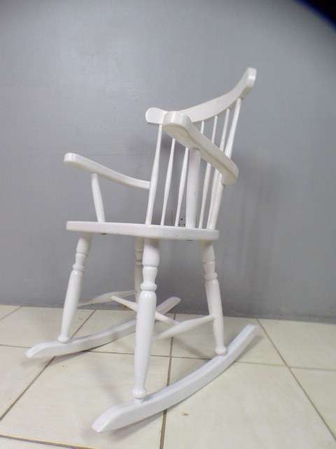 An exquisite white painted rocking chair - gorgeous in a baby room or on a patio!!!
