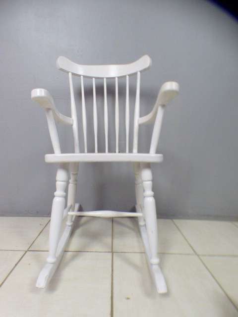 An exquisite white painted rocking chair - gorgeous in a baby room or on a patio!!!
