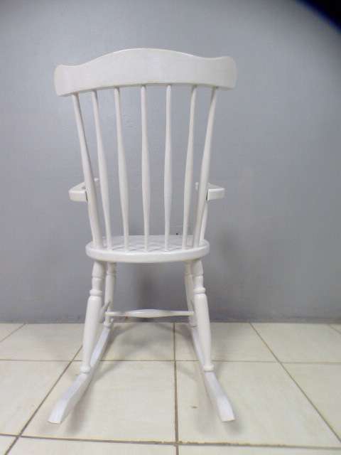 An exquisite white painted rocking chair - gorgeous in a baby room or on a patio!!!