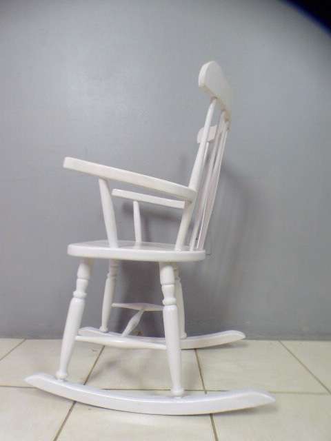 An exquisite white painted rocking chair - gorgeous in a baby room or on a patio!!!