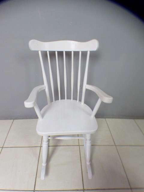 An exquisite white painted rocking chair - gorgeous in a baby room or on a patio!!!