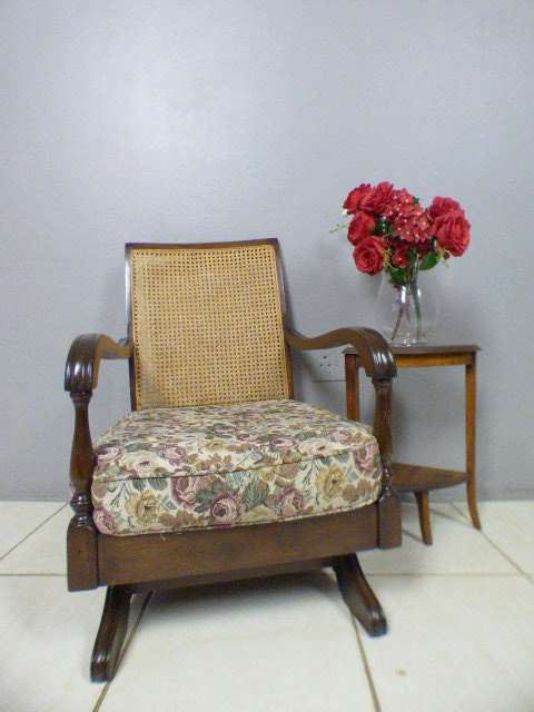 A gorgeous vintage light Imbuia rattan backed rocking chair, fantastic in a sun room, patio, porch!!
