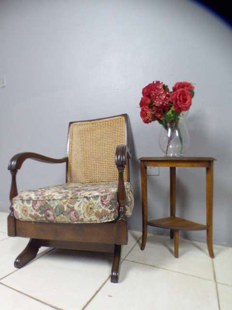 A gorgeous vintage light Imbuia rattan backed rocking chair, fantastic in a sun room, patio, porch!!