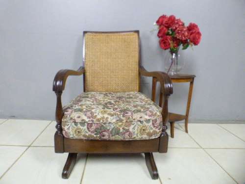 A gorgeous vintage light Imbuia rattan backed rocking chair, fantastic in a sun room, patio, porch!!