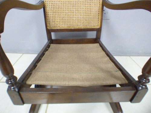 A gorgeous vintage light Imbuia rattan backed rocking chair, fantastic in a sun room, patio, porch!!