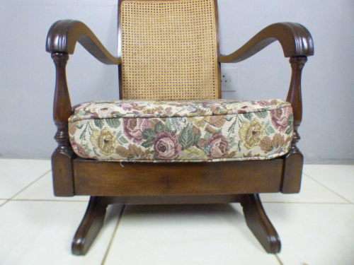 A gorgeous vintage light Imbuia rattan backed rocking chair, fantastic in a sun room, patio, porch!!