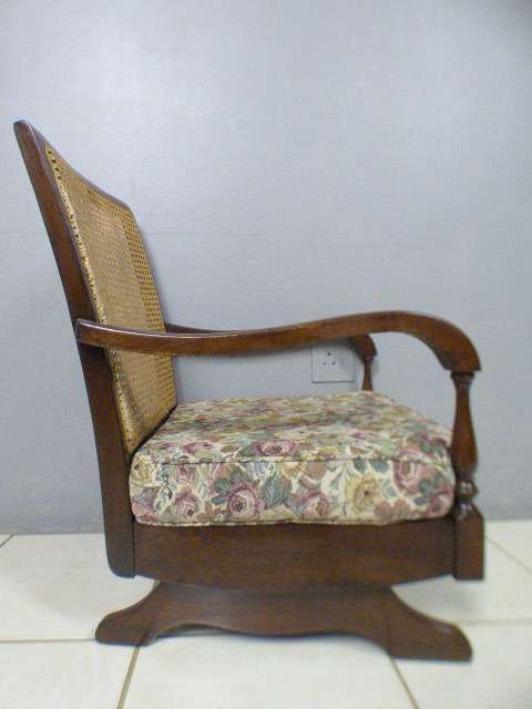 A gorgeous vintage light Imbuia rattan backed rocking chair, fantastic in a sun room, patio, porch!!