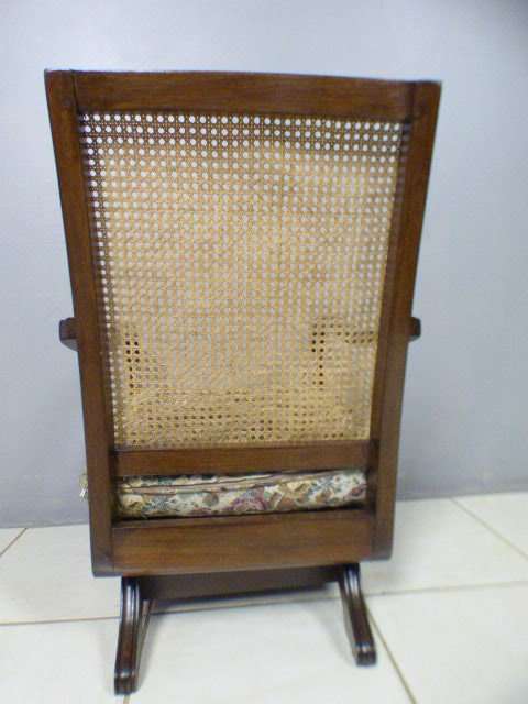 A gorgeous vintage light Imbuia rattan backed rocking chair, fantastic in a sun room, patio, porch!!