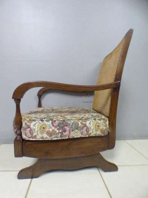 A gorgeous vintage light Imbuia rattan backed rocking chair, fantastic in a sun room, patio, porch!!