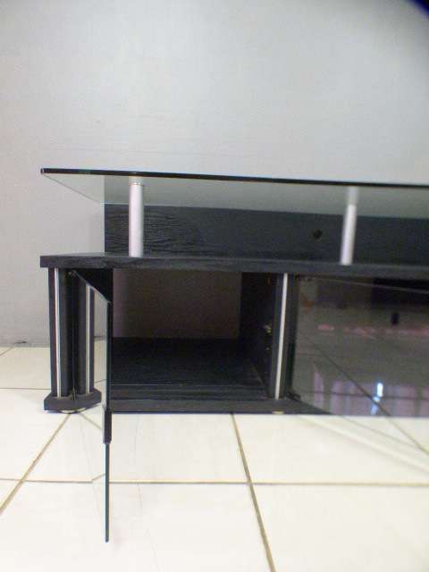 A stunning stylish TV stand with place for your entertainment centre and a thick glass top RS17