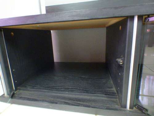 A stunning stylish TV stand with place for your entertainment centre and a thick glass top RS17
