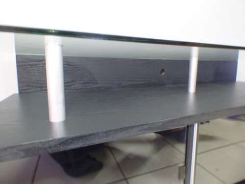 A stunning stylish TV stand with place for your entertainment centre and a thick glass top RS17