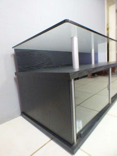 A stunning stylish TV stand with place for your entertainment centre and a thick glass top RS17