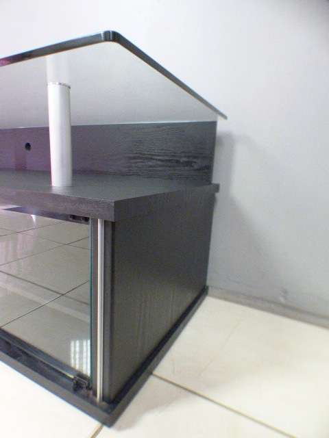A stunning stylish TV stand with place for your entertainment centre and a thick glass top RS17