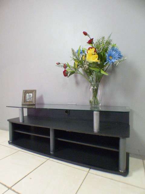 A stunning & stylish tv stand w place for an entertainment center, great in smaller areas RS17Sale