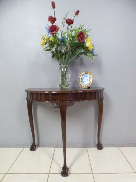A beautiful vintage ball & claw Imbuia half moon display/occasional table. Gorgeous in an entrance!!