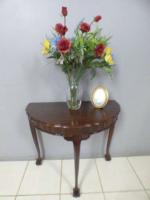 A beautiful vintage ball & claw Imbuia half moon display/occasional table. Gorgeous in an entrance!!