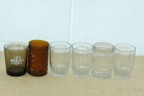 An awesome collection of assorted drinking glasses including branded glasses - bid/glass
