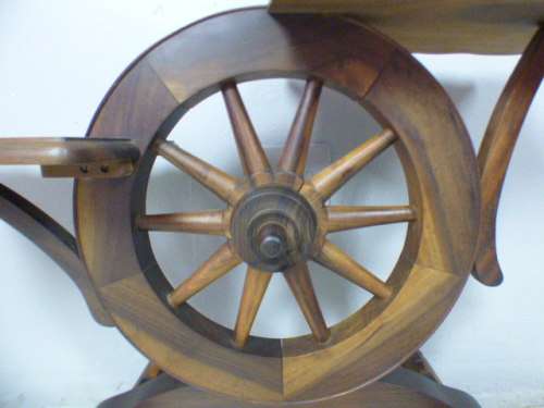A gorgeous display table with a beautiful wagon wheel as the centre. Fantastic solid wood!!