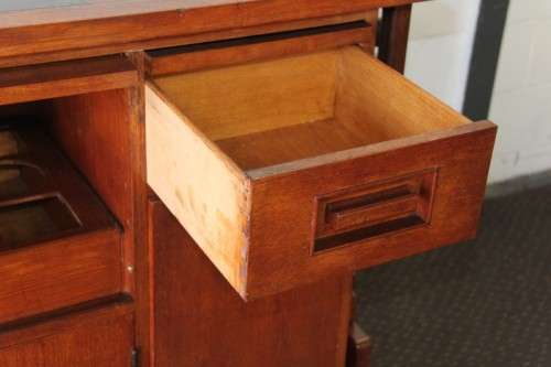 An extraordinary solid teak compact bar unit with solid green marble top and carved detailing