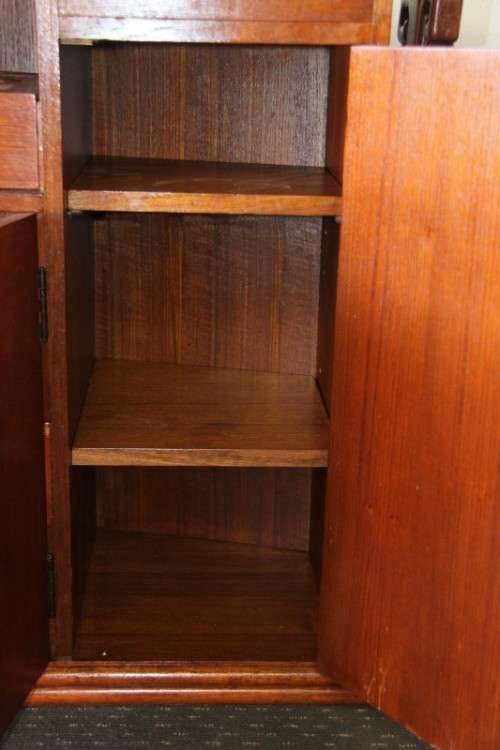 An extraordinary solid teak compact bar unit with solid green marble top and carved detailing